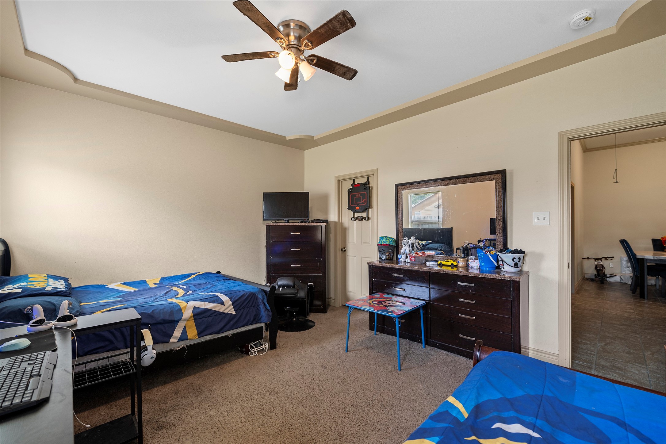 1541 3rd Street Hempstead, TX 77445 - Photo 12 of 26 a bedroom with a bed and furniture