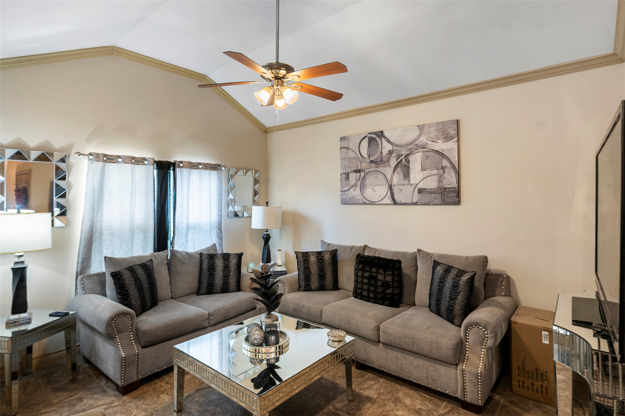 1541 3rd Street Hempstead, TX 77445 - Photo 2 of 26 a living room with furniture a ceiling fan and a rug