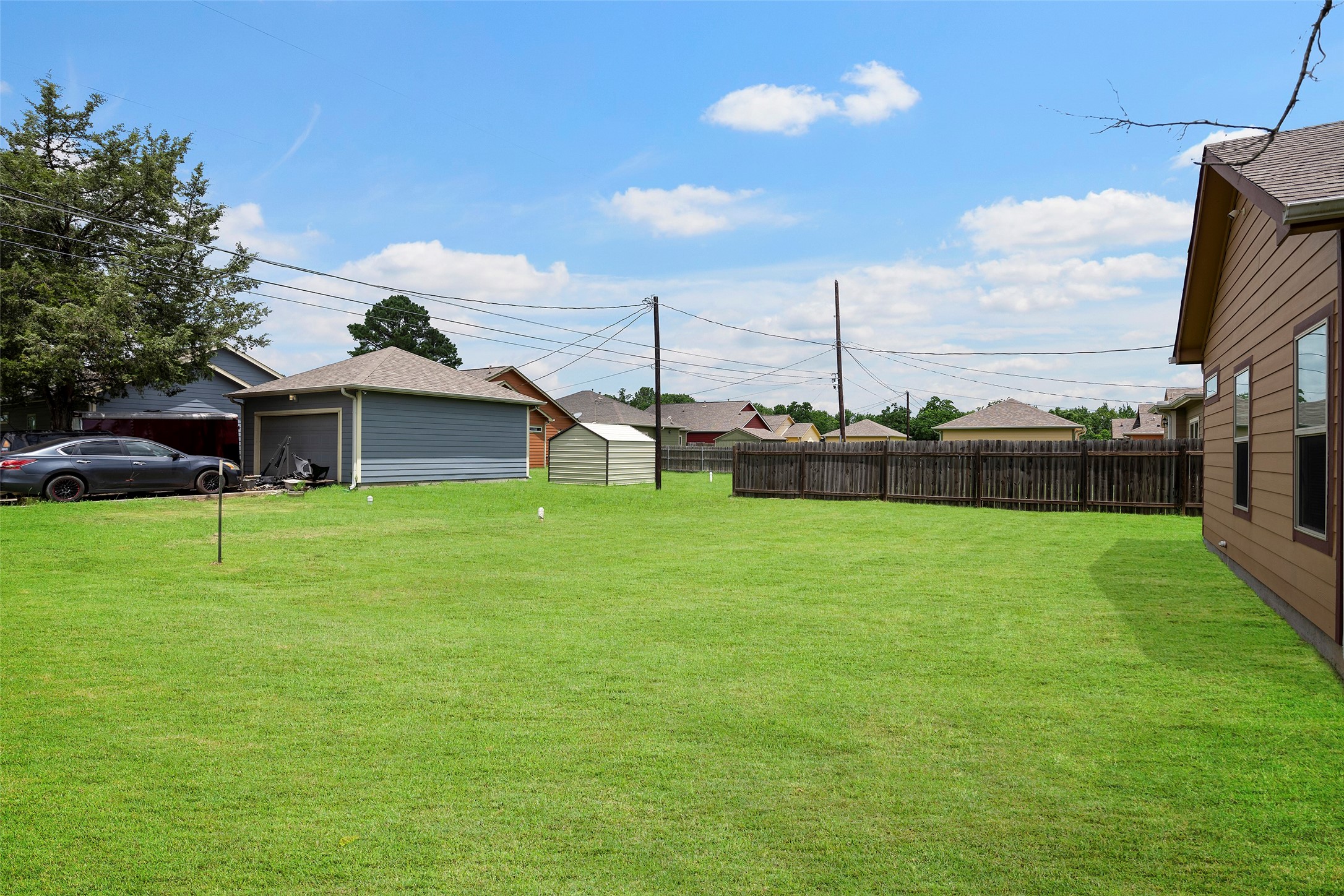 1541 3rd Street Hempstead, TX 77445 - Photo 24 of 26 a front view of house with a garden