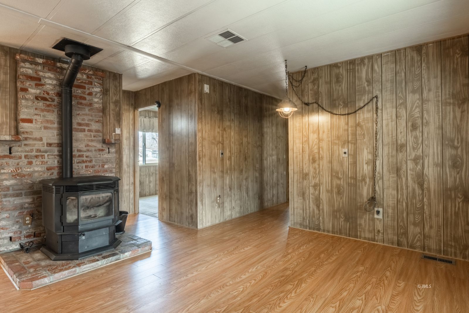 1358 MacGregor Avenue Bishop, CA 93514 - Photo 12 of 30 a view of hallway with stairs and wooden floor