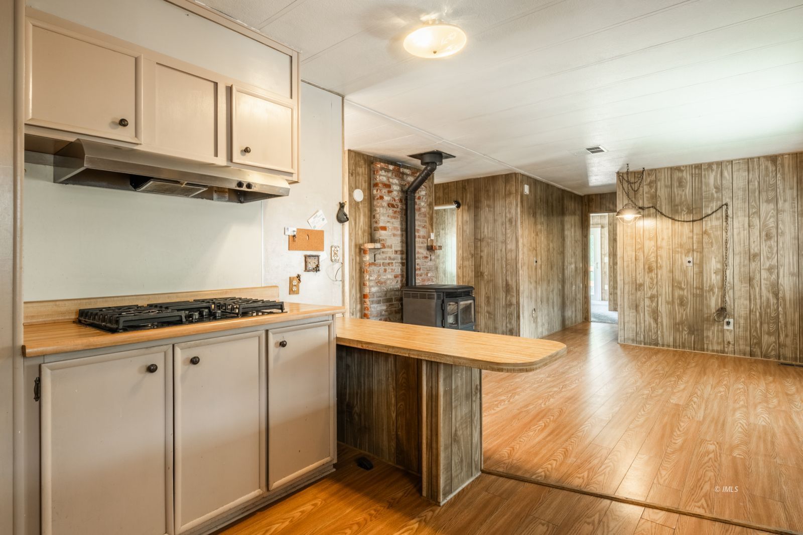 1358 MacGregor Avenue Bishop, CA 93514 - Photo 10 of 30 a kitchen with stainless steel appliances granite countertop a stove and a refrigerator