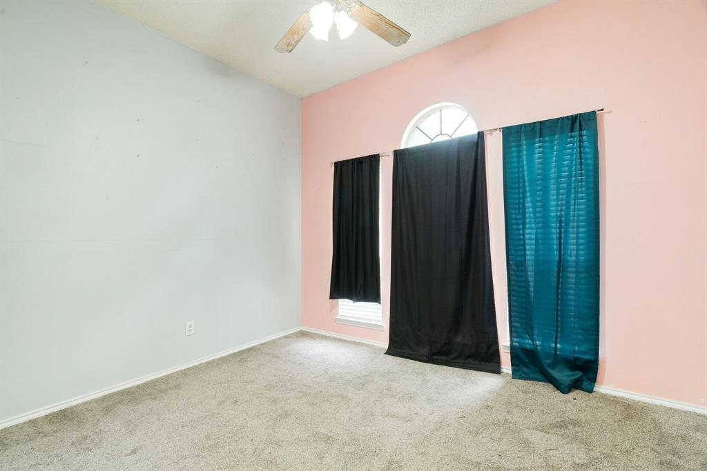 455 Timber Lakes Drive Powderly, TX 75473 - Photo 11 of 18 an empty room with closet and entryway