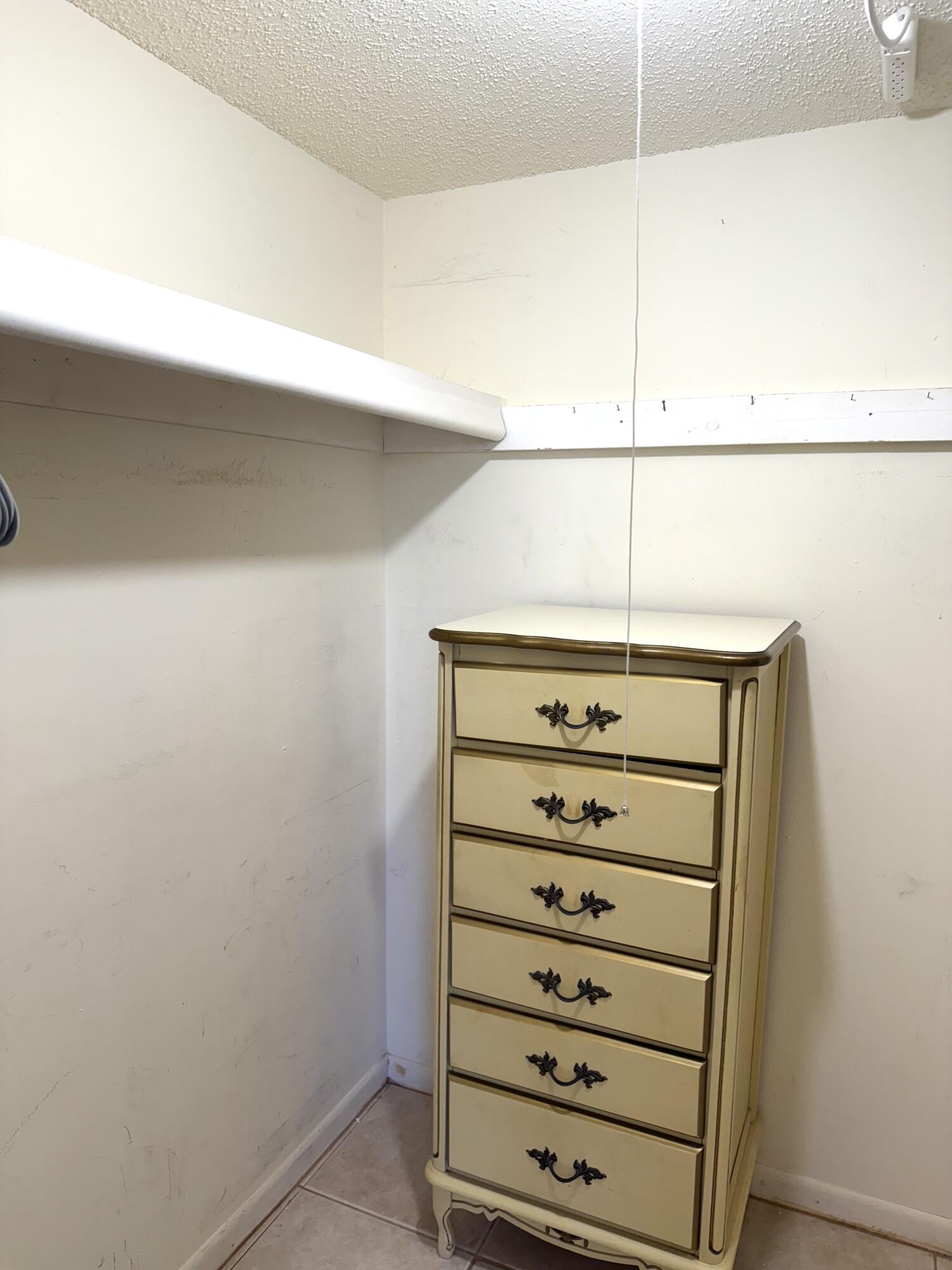 9272 Southwest 3rd Street, Unit 407 Boca Raton, FL 33428 - Photo 42 of 51 Walk-In Closet 1