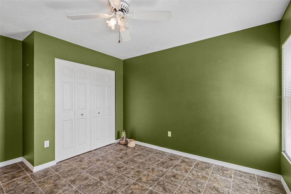 119 Burns Road Terra Ceia, FL 34250 - Photo 61 of 100 a view of a big room with a chandelier fan and closet