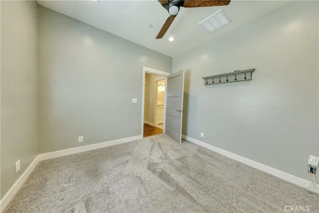 a bathroom with a sink double vanity and a mirror