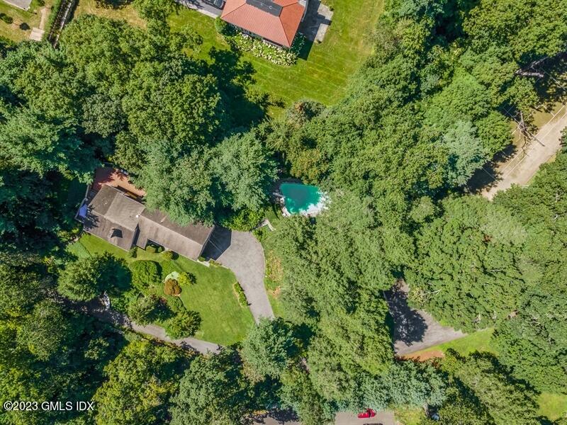 20 Hill Road Greenwich, CT 06830 - Photo 6 of 8 an aerial view of a house with yard