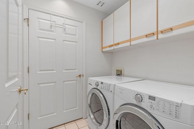a view of a house with porch and garden