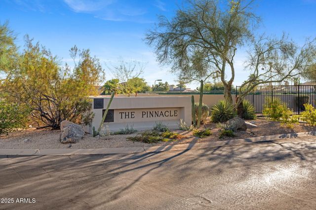 a view of a park with swings and slides