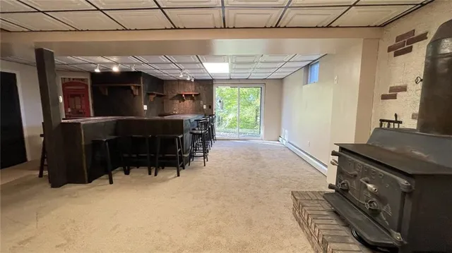 a view of workspace with furniture and window