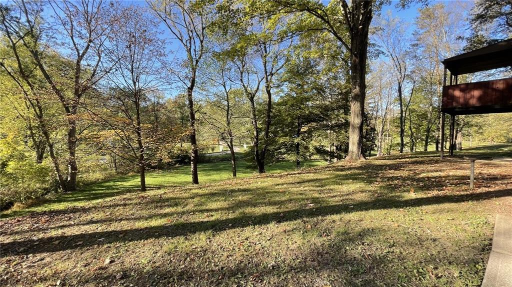 303 Elkhorn Road Monaca, PA 15061 - Photo 18 of 19 a view of a house with a yard