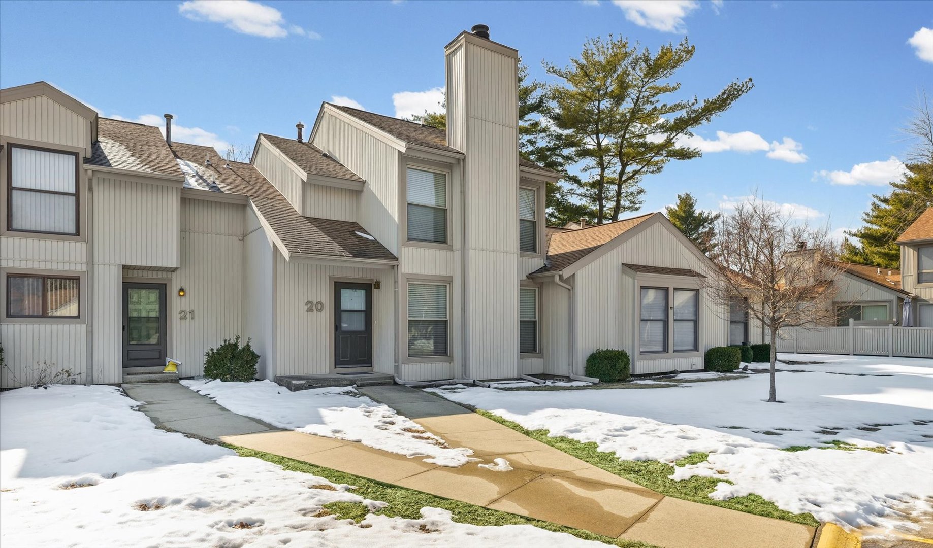 a view of a building with a yard