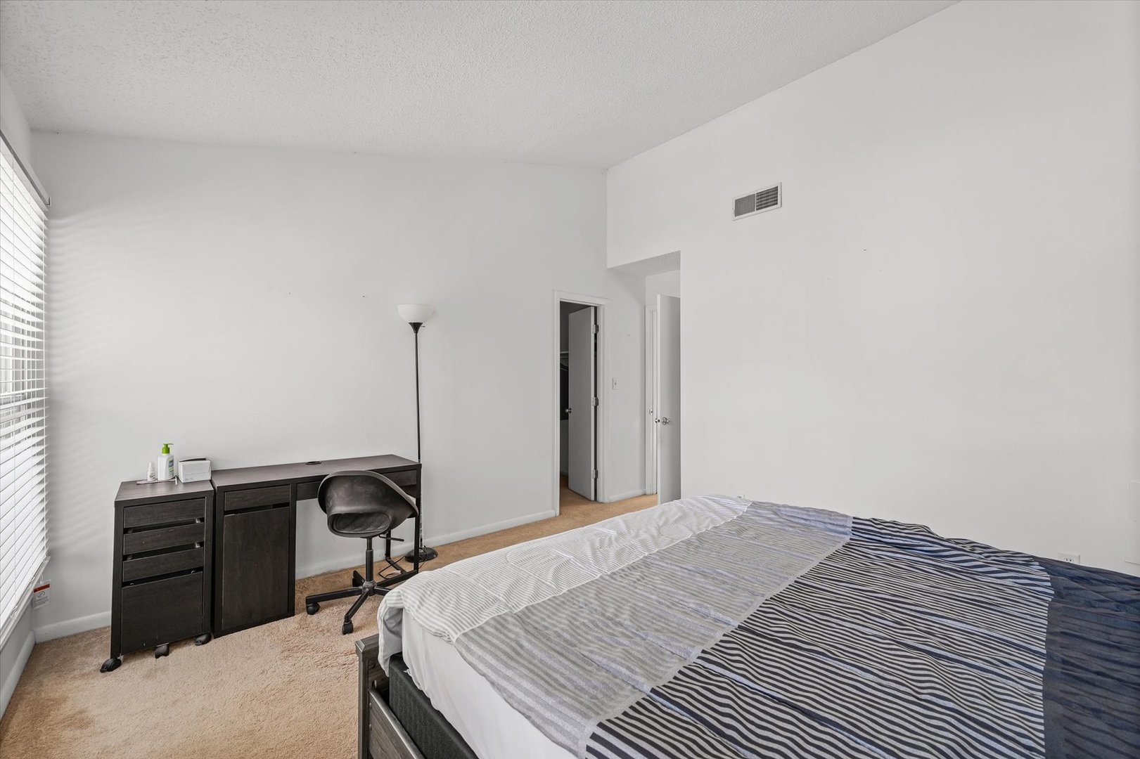 20 Colony W Drive Champaign, IL 61820 - Photo 17 of 26 a bedroom with a bed and a dresser