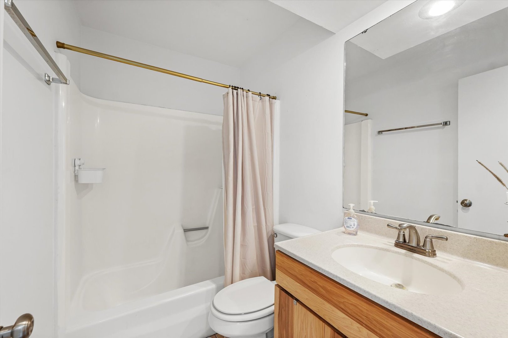 20 Colony W Drive Champaign, IL 61820 - Photo 18 of 26 a bathroom with a granite countertop sink toilet and shower