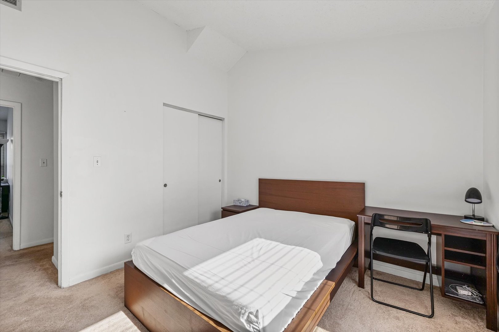 20 Colony W Drive Champaign, IL 61820 - Photo 22 of 26 a bedroom with a bed and a table in it