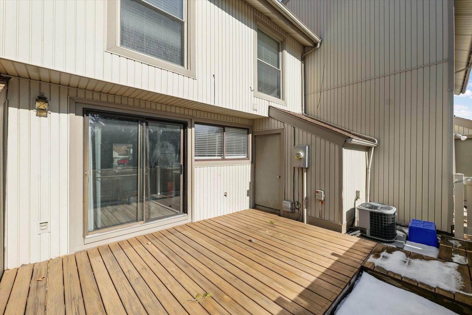 20 Colony W Drive Champaign, IL 61820 - Photo 24 of 26 a view of a house with a barbeque and wooden floor