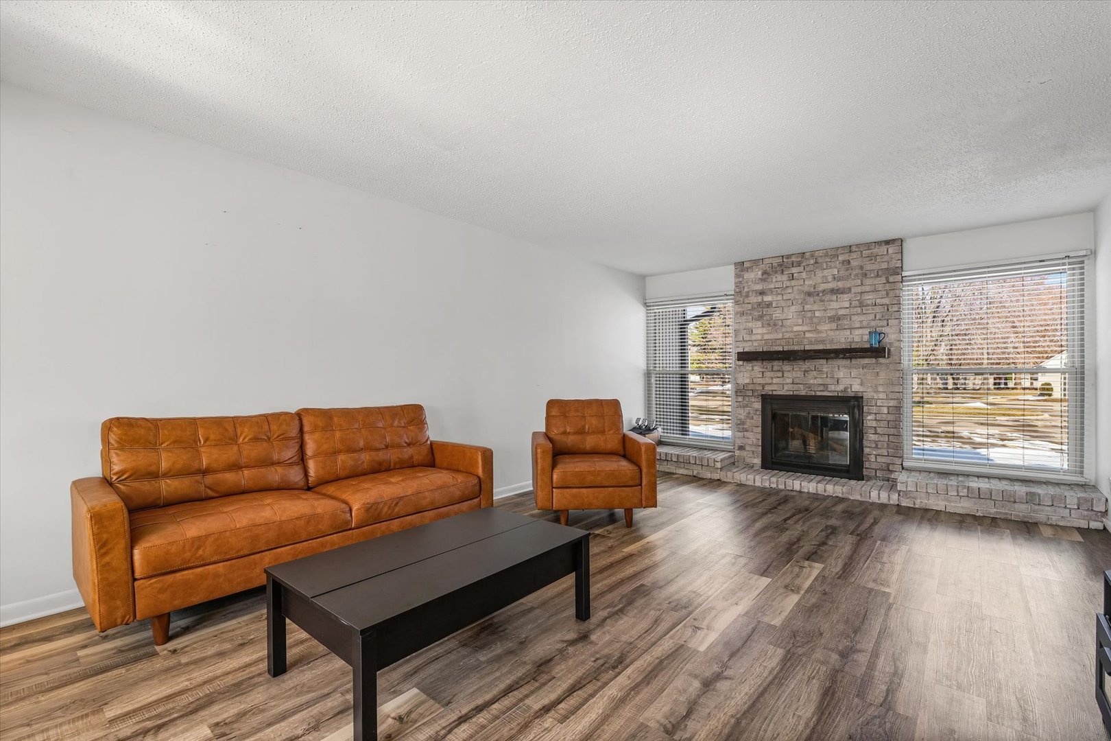 20 Colony W Drive Champaign, IL 61820 - Photo 5 of 26 a living room with furniture and a fireplace