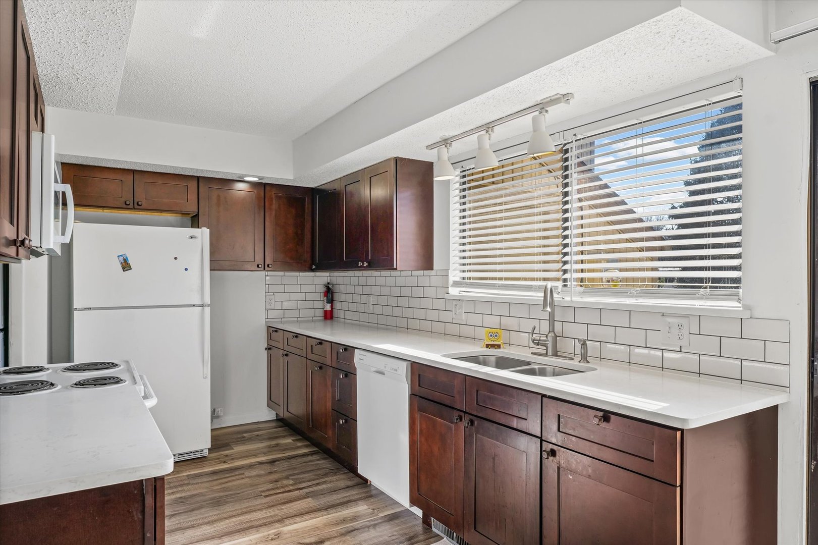 20 Colony W Drive Champaign, IL 61820 - Photo 10 of 26 a kitchen with a sink and cabinets