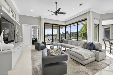 a spacious bedroom with a bed and a couch