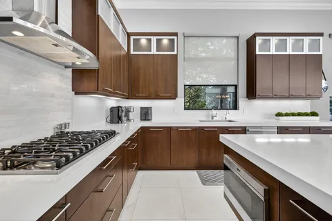 a bed room with a bed and a night stand