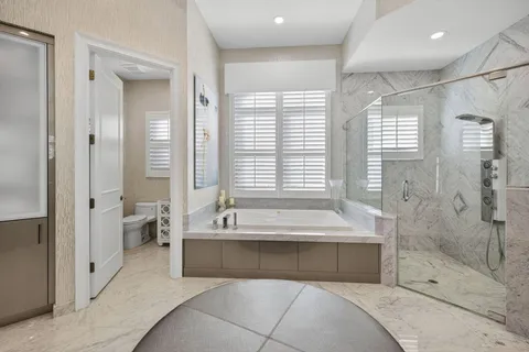 an aerial view of a house with a garden and plants