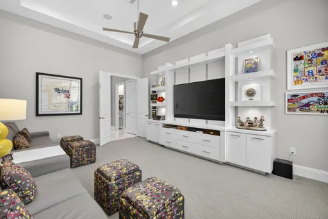 a room with furniture and a flat screen tv