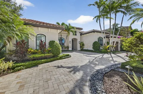 a living room with furniture fireplace and a flat screen tv