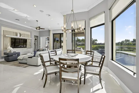 a kitchen with stainless steel appliances kitchen island granite countertop a sink and cabinets
