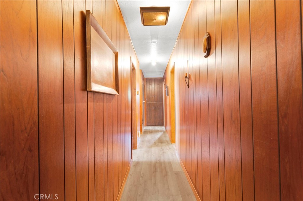 5500 Oil Well Road Phelan, CA 92371 - Photo 20 of 65 a view of a hallway with wooden floor