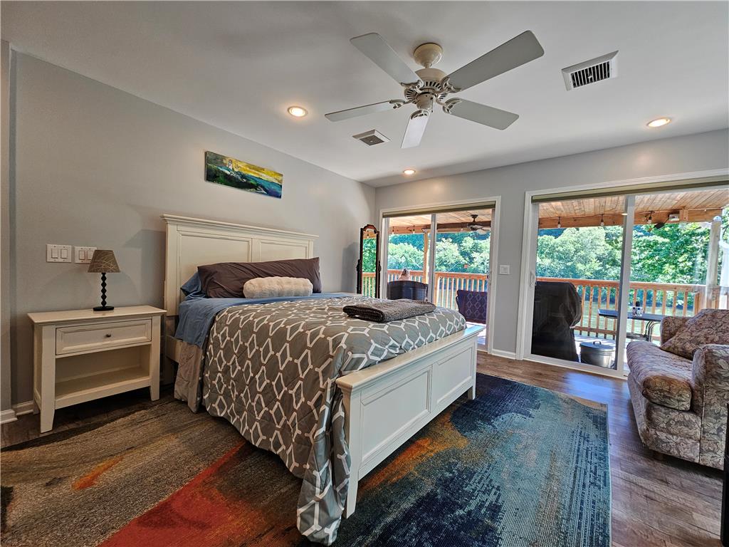 190 Canal Road Easton, PA 18042 - Photo 13 of 39 a bedroom with a large bed and a chandelier