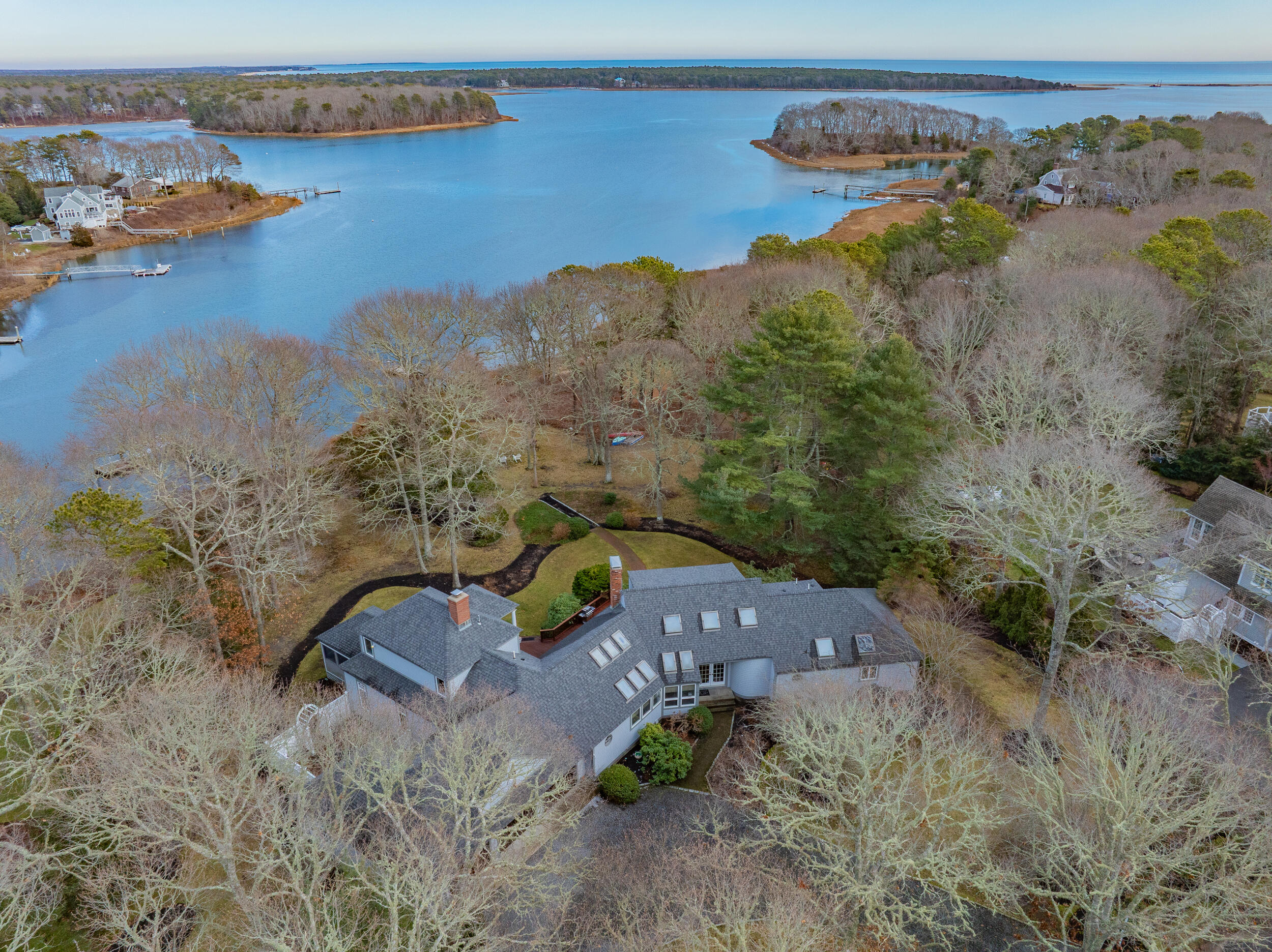 52 Old Dock Lane Mashpee, MA 02649 - Photo 53 of 56 an aerial view of a house with outdoor space