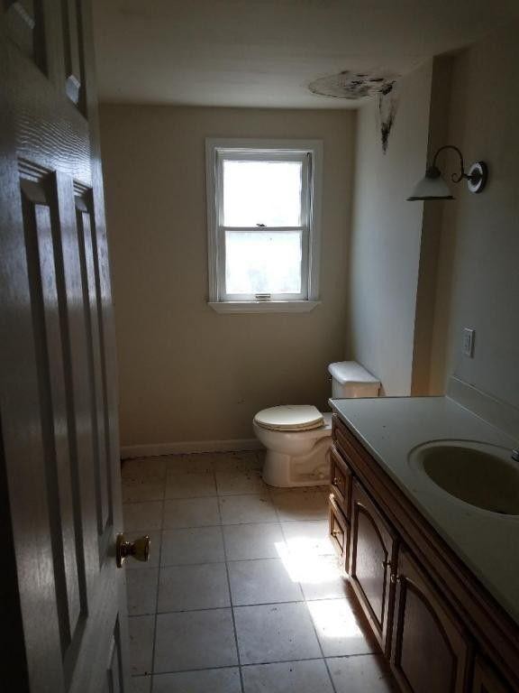 899 New Light Road Winfield, TN 37892 - Photo 12 of 12 a bathroom with a sink toilet and shower