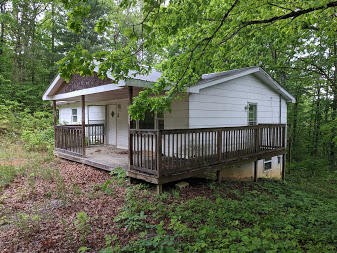 899 New Light Road Winfield, TN 37892 - Photo 3 of 12 a view of a house with a yard and deck