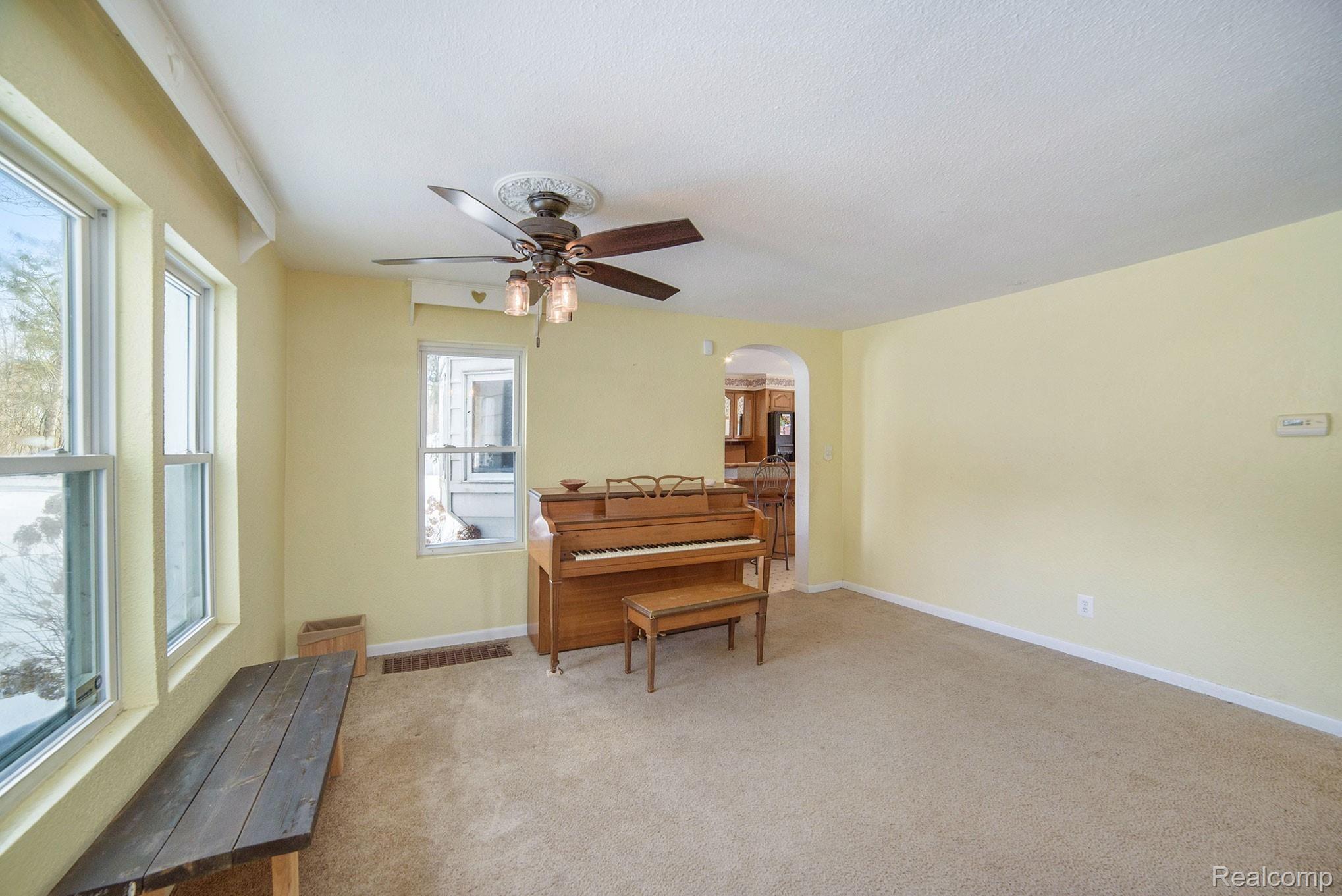 1458 Rochester Road Leonard, MI 48367 - Photo 4 of 32 Formal Dining area, currently used for Piano playing/listening