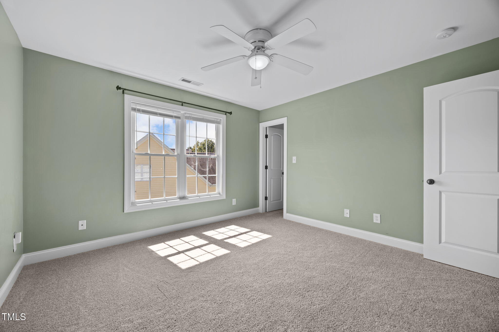 6313 Southern Charm Lane Raleigh, NC 27603 - Photo 27 of 38 a view of empty room with window