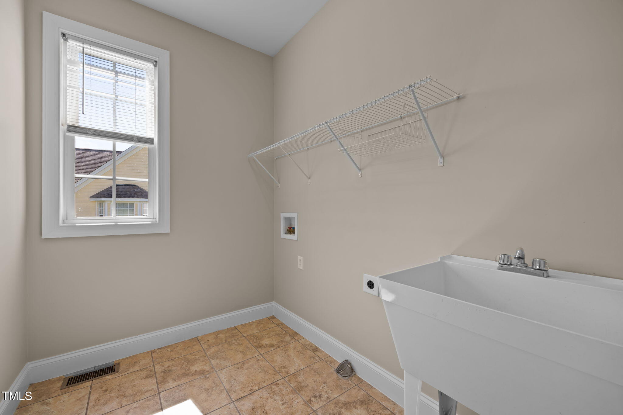 6313 Southern Charm Lane Raleigh, NC 27603 - Photo 30 of 38 a view of a bathroom with a bathtub