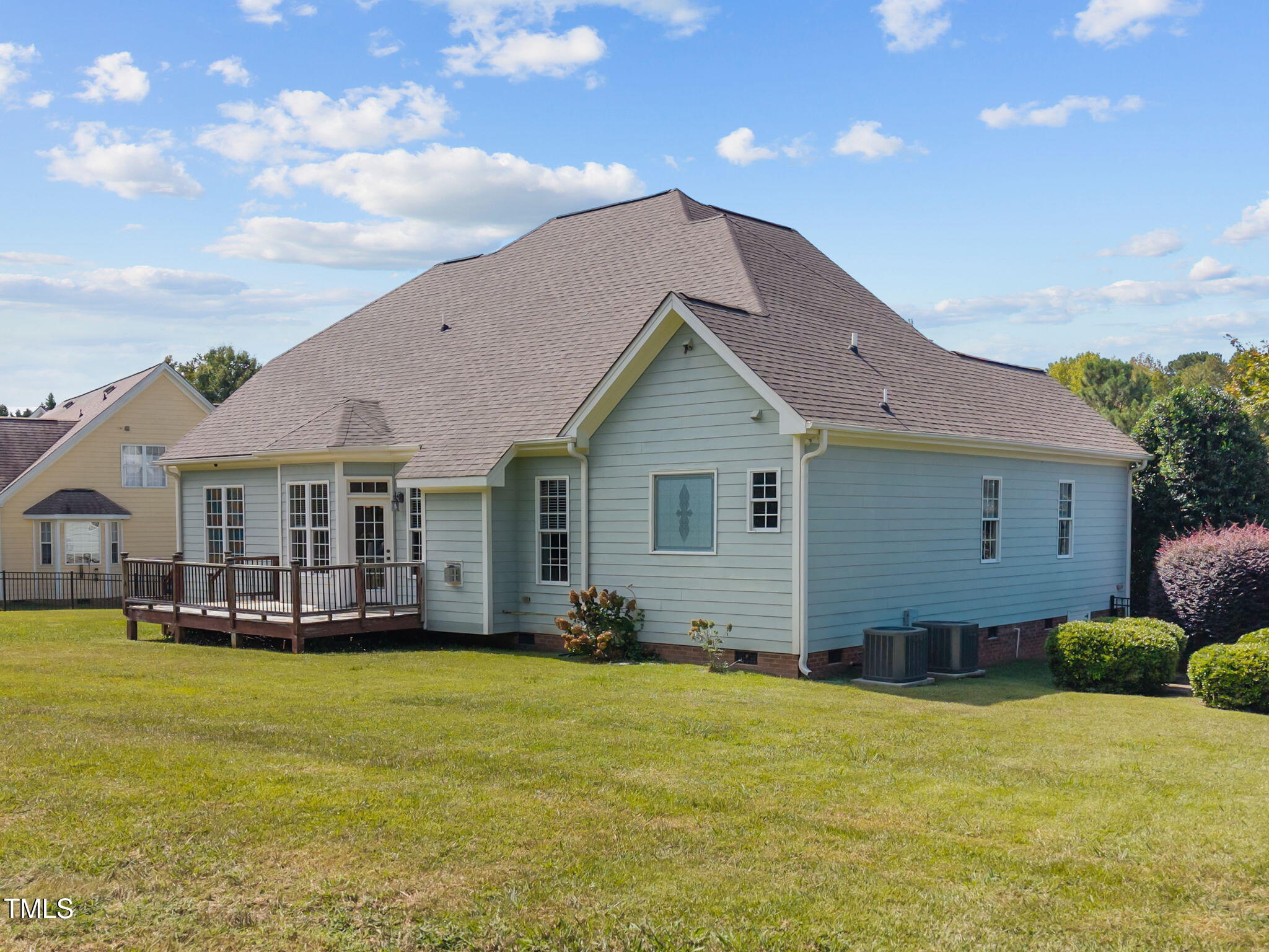 6313 Southern Charm Lane Raleigh, NC 27603 - Photo 32 of 38 a view of a house with a yard