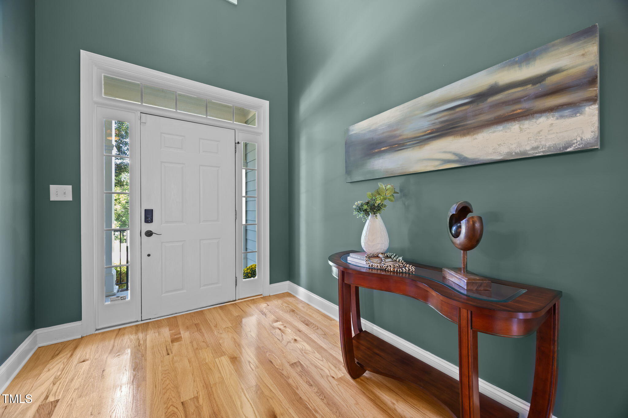 6313 Southern Charm Lane Raleigh, NC 27603 - Photo 7 of 38 a bedroom with a bed and a table