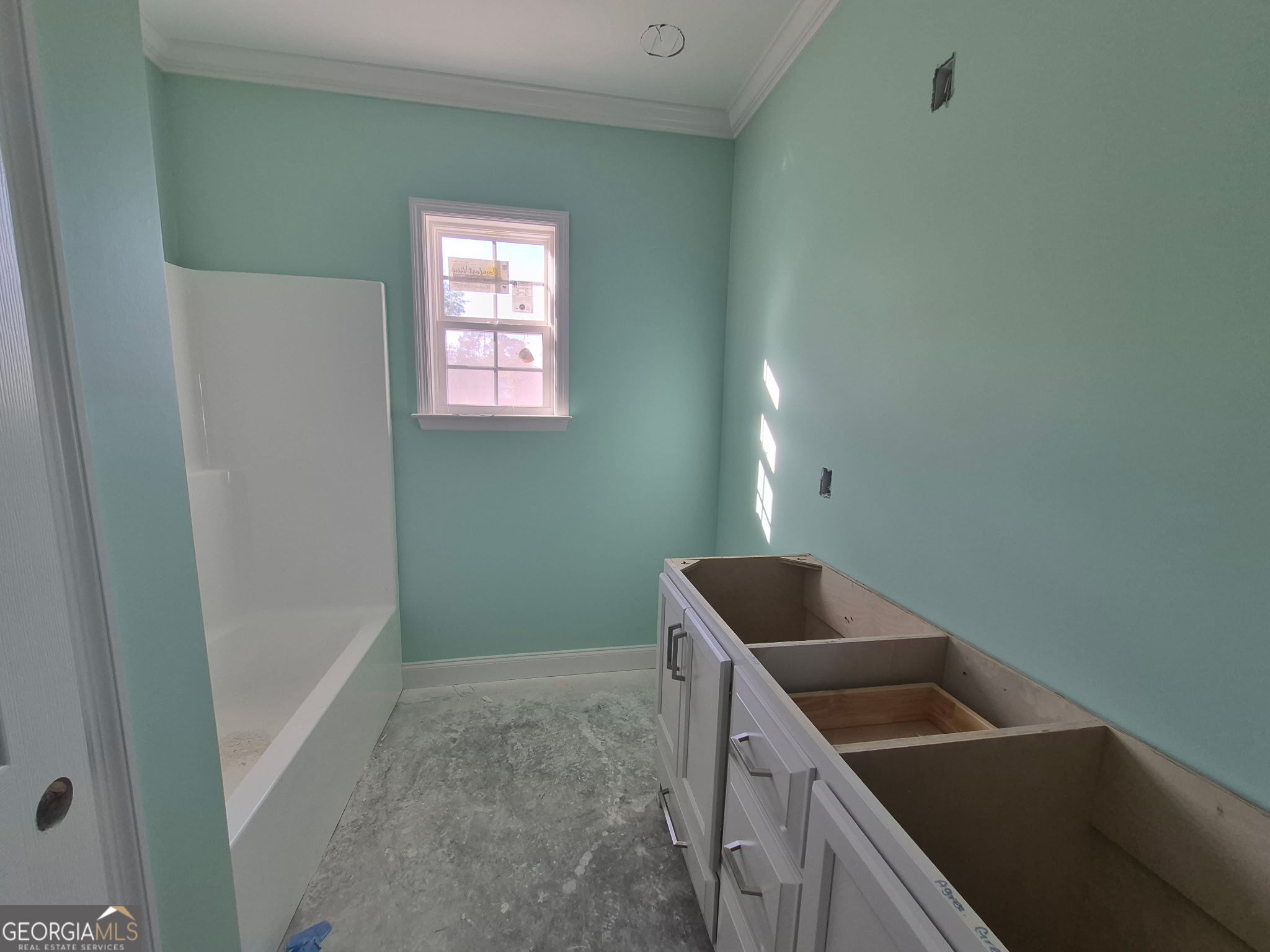 108 Ira Corbitt Road Lakeland, GA 31635 - Photo 16 of 23 a bathroom with a sink a vanity and window