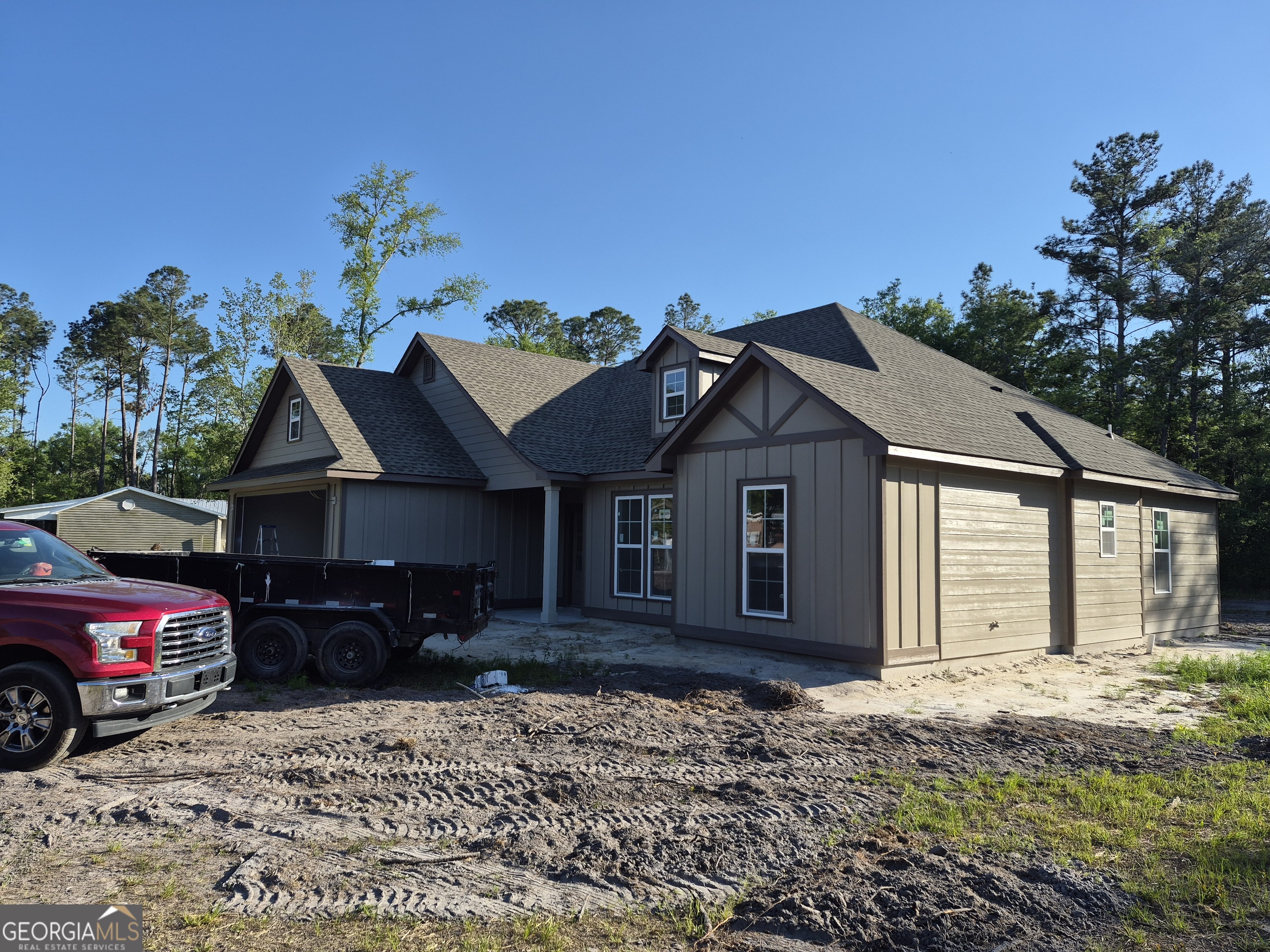108 Ira Corbitt Road Lakeland, GA 31635 - Photo 6 of 23 a front view of a house with a yard