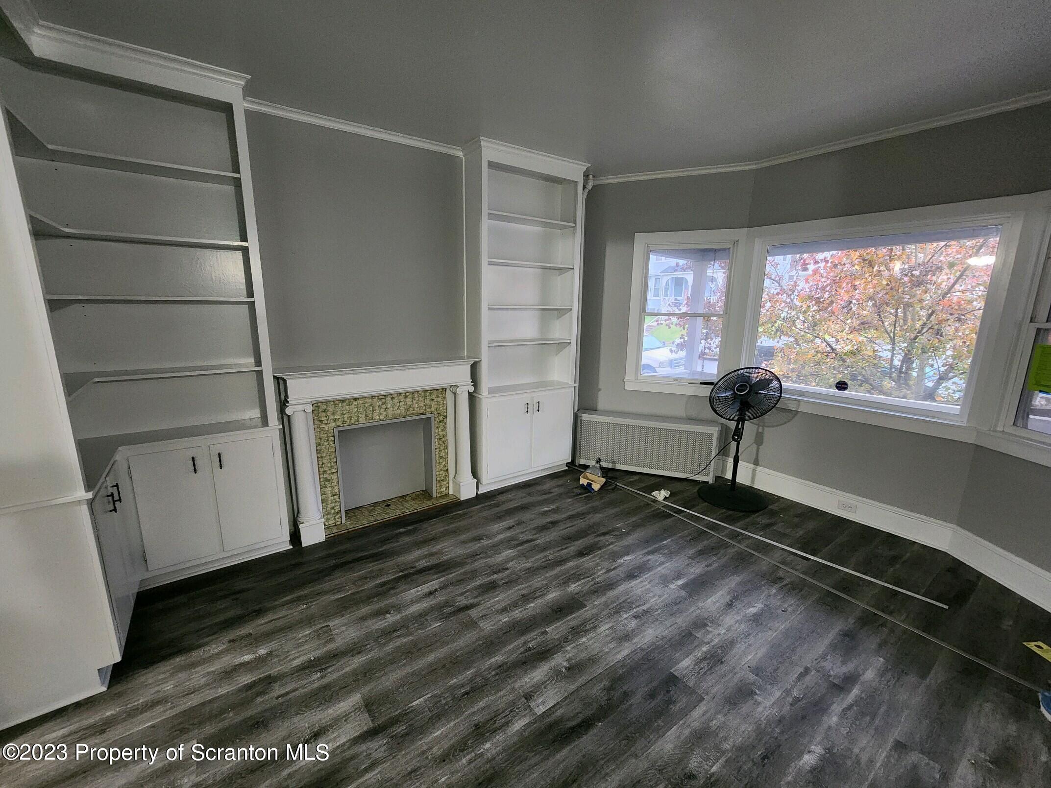 817 Monroe Avenue, Unit 1 Scranton, PA 18510 - Photo 1 of 8 a room with window