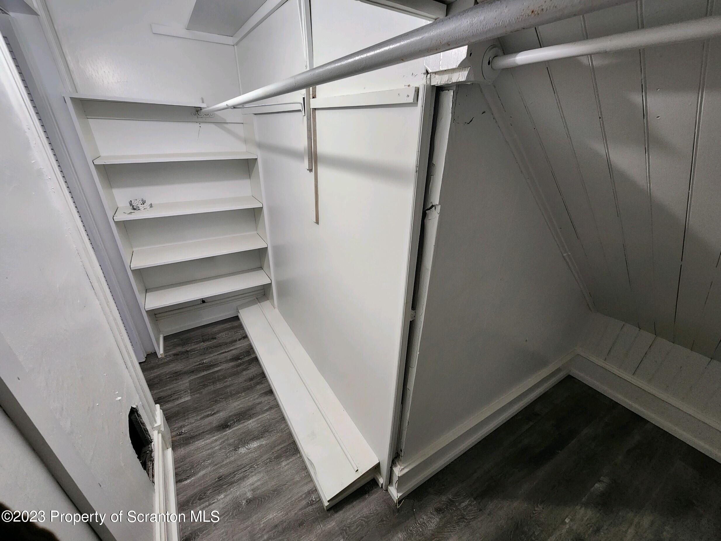 817 Monroe Avenue, Unit 1 Scranton, PA 18510 - Photo 8 of 8 a view of walk in closet with empty racks