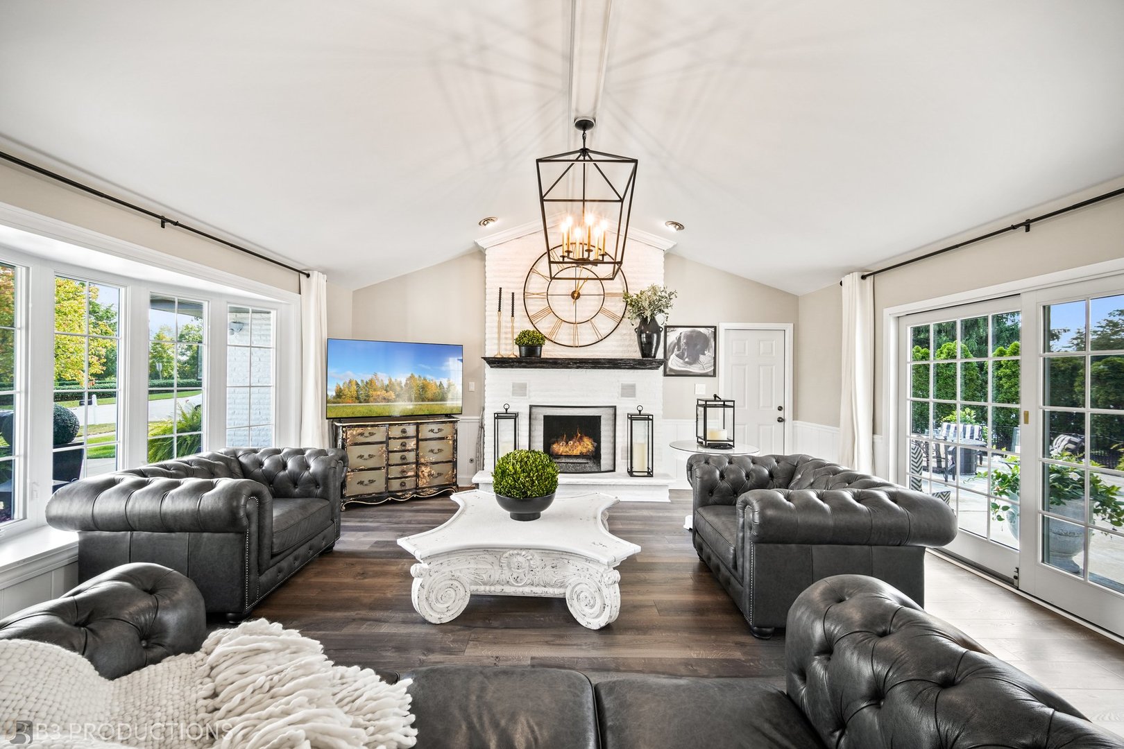 238 Larch Road Frankfort, IL 60423 - Photo 5 of 27 a living room with furniture a fireplace and large windows