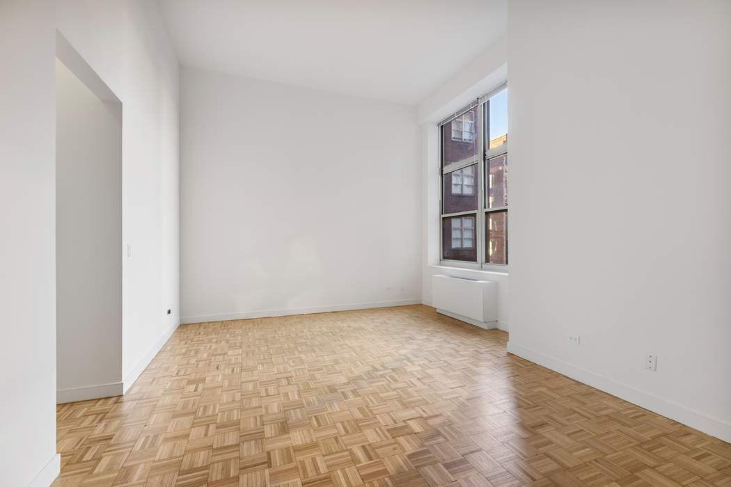 120 East 87th Street, Unit R14K Manhattan, NY 10128 - Photo 4 of 14 a view of an empty room with window
