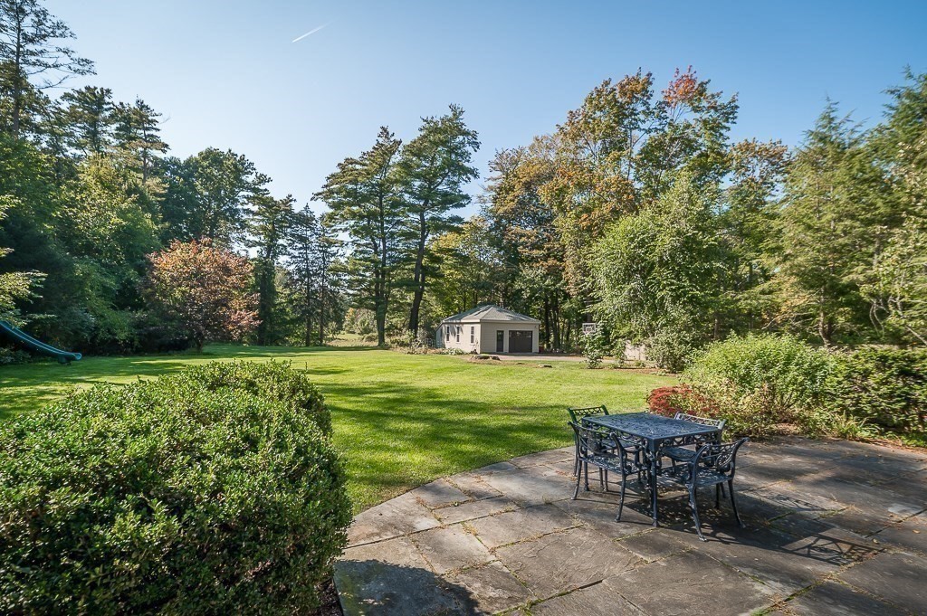 8 Walnut Road Wenham, MA 01984 - Photo 3 of 42 a view of a sitting area with trees in the background