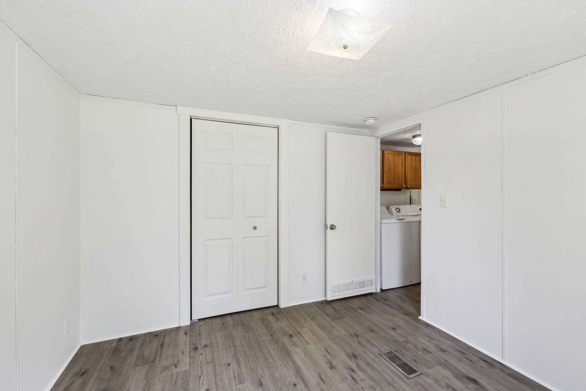 161 Longbranch Road Hohenwald, TN 38462 - Photo 16 of 28 a view of hallway with wooden floor
