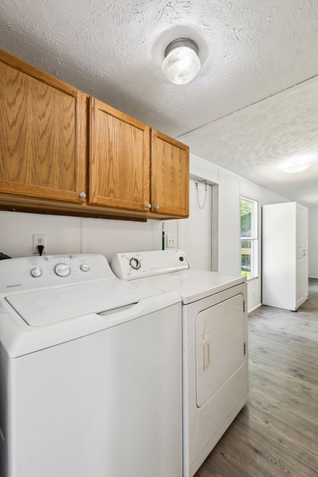 161 Longbranch Road Hohenwald, TN 38462 - Photo 17 of 28 a utility room with dryer and washer