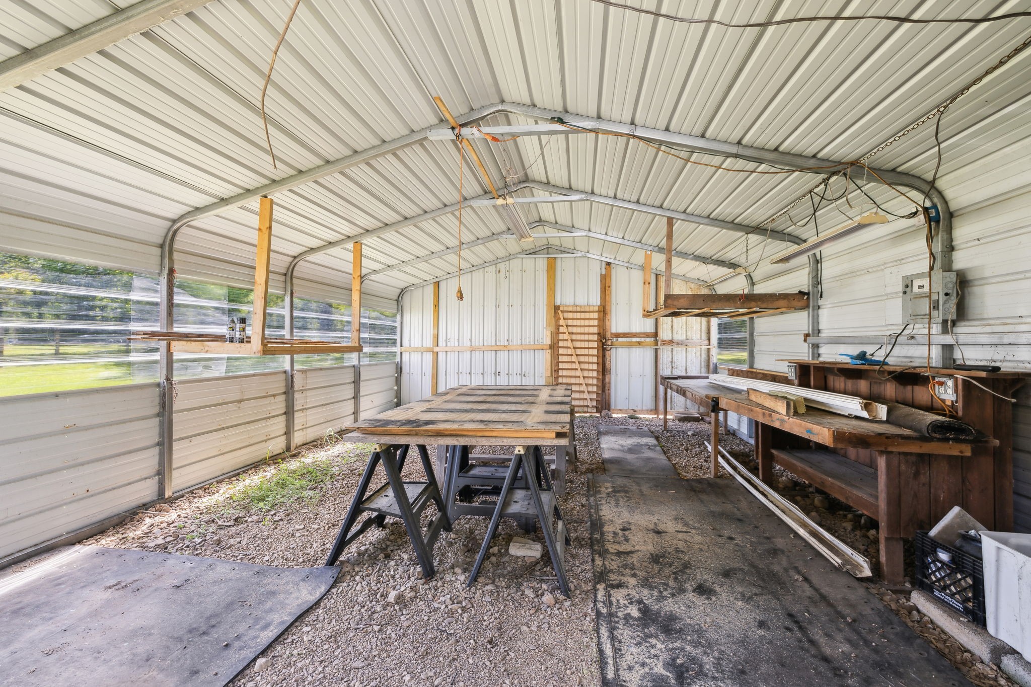 161 Longbranch Road Hohenwald, TN 38462 - Photo 21 of 28 a view of a chairs and table in the patio