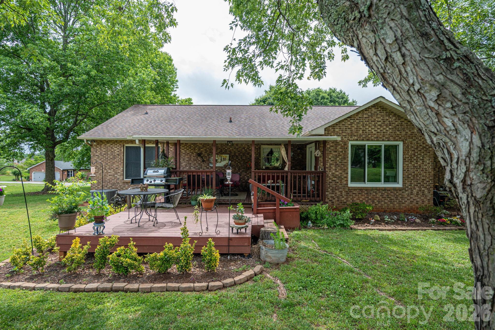 3815 Wildcherry Road Shelby, NC 28150 - Photo 6 of 33 a house view with a garden space and garden