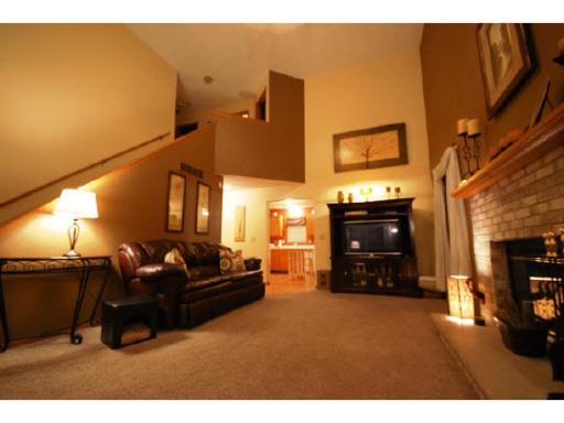 654 Bayfield Road Rockton, IL 61072 - Photo 3 of 11 a living room with furniture and a fireplace