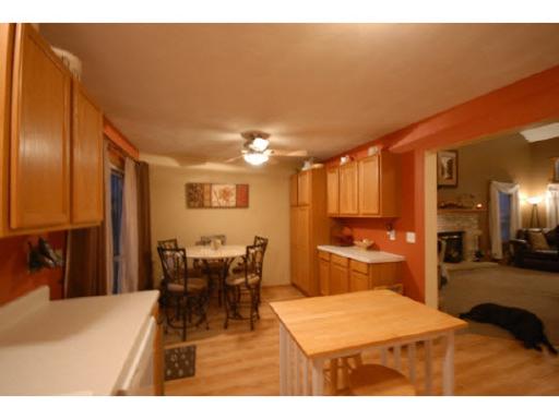 654 Bayfield Road Rockton, IL 61072 - Photo 5 of 11 a dining room with a table and chairs